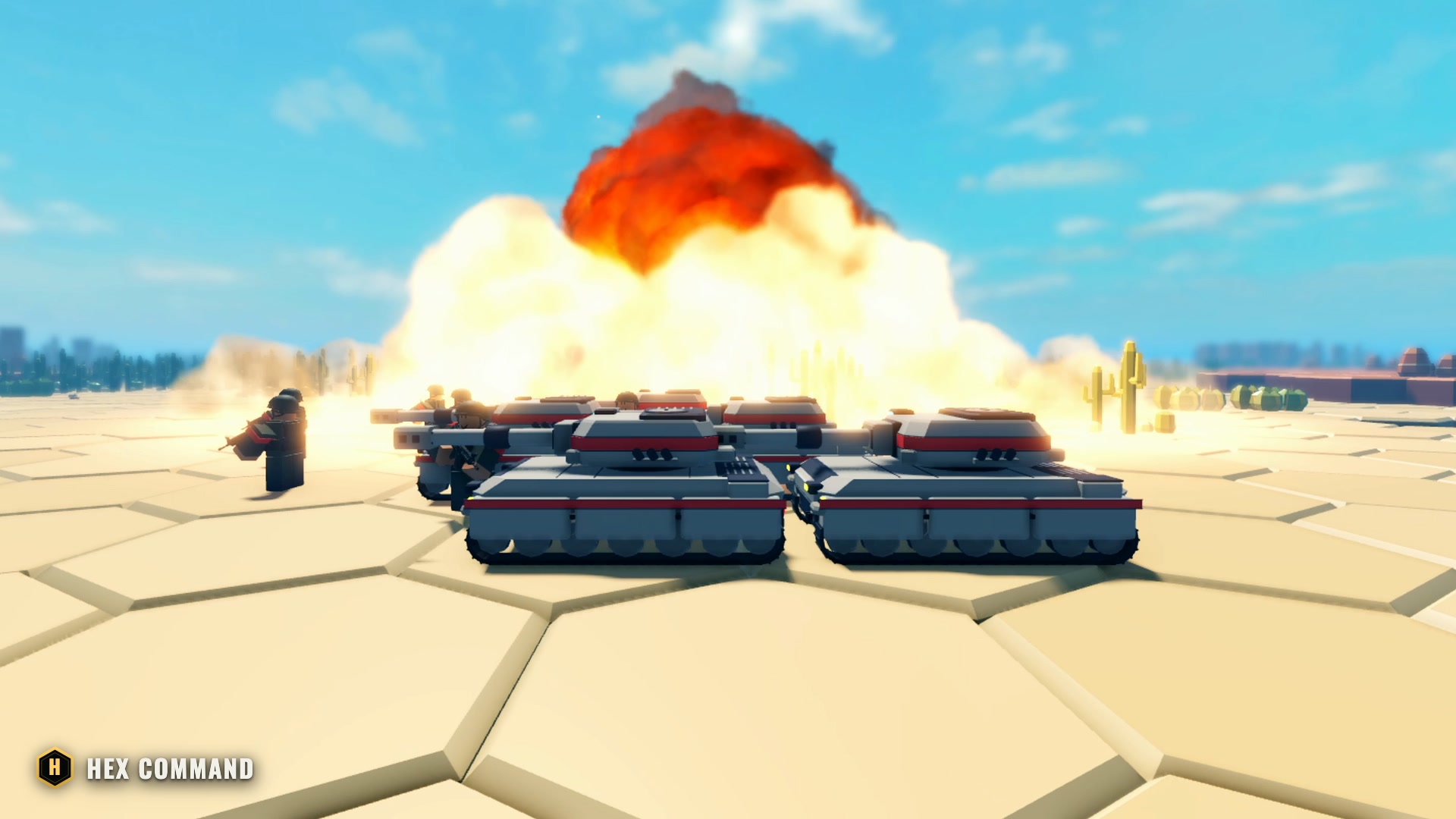 The Strike's fireball rises behind a line of Heavy Tanks in the Canyon